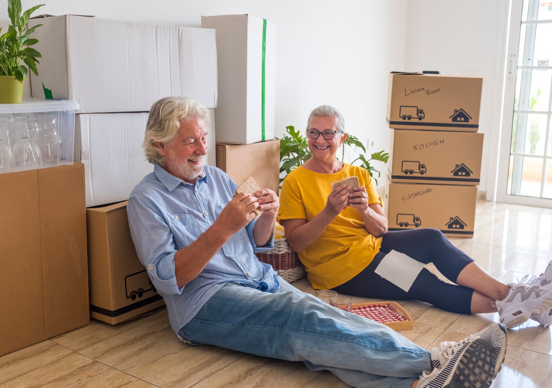 Happy senior couple in their new home
