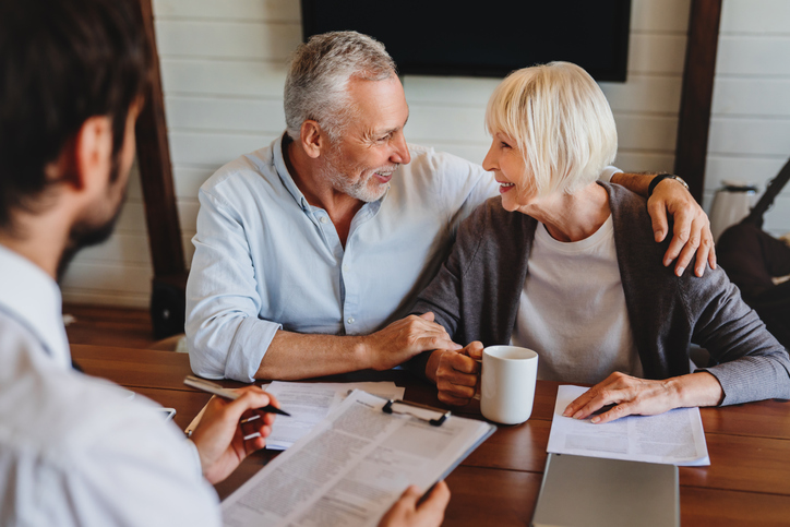 Male Employee connects with senior couple