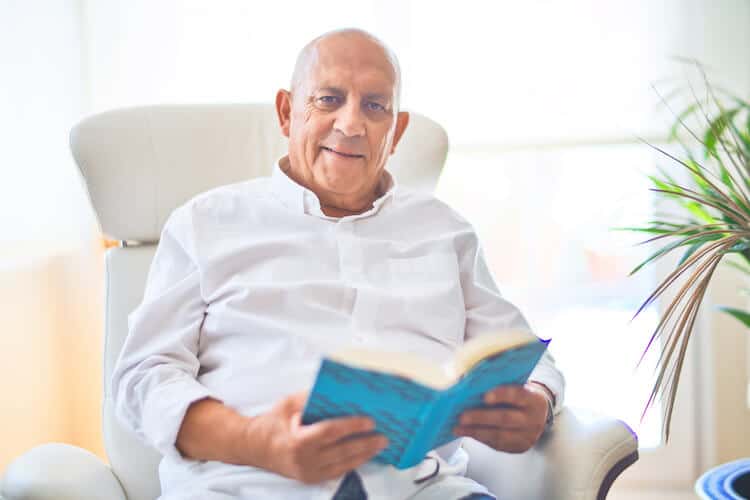 Senior man enjoying his home at a senior living community.